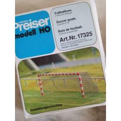Miniatuur voetbal teams en goals