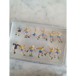 Miniatuur voetbal teams en goals