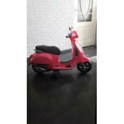 Electrische vespa voor kinderen