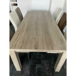 Eettafel originele hout met 6 leren stoelen