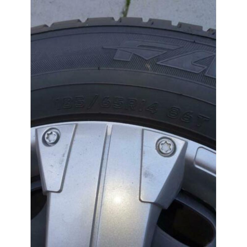 4 stuks zgan winterbanden 185/65R14 86T