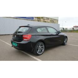 BMW 1 serie - 114i 2012 - zwart 96K km - Kenteken: H-295-JK
