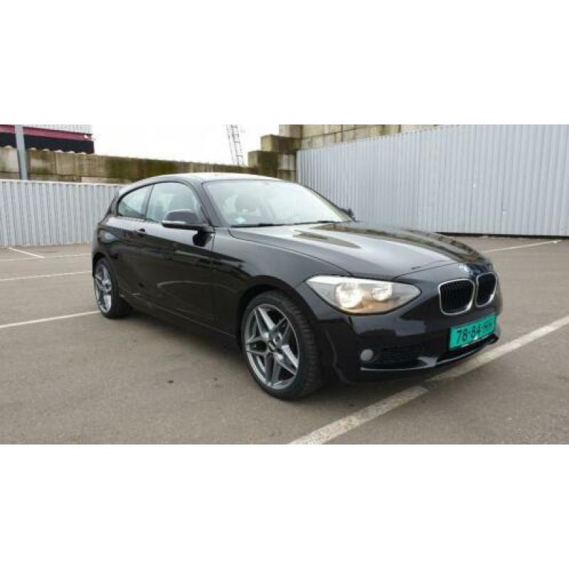BMW 1 serie - 114i 2012 - zwart 96K km - Kenteken: H-295-JK