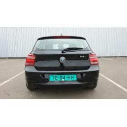 BMW 1 serie - 114i 2012 - zwart 96K km - Kenteken: H-295-JK