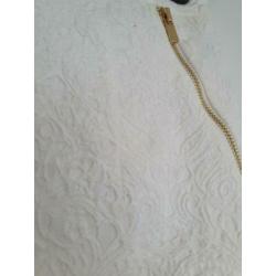 Crème kleurige rok mt. 38