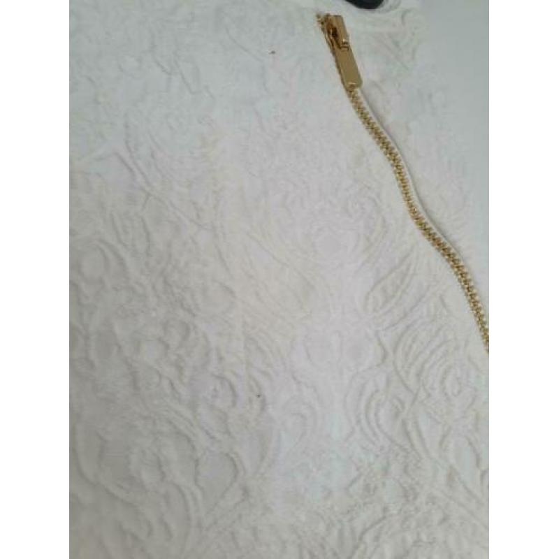 Crème kleurige rok mt. 38