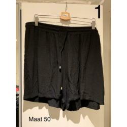 Mooie kleding van MS Mode maat staat op de foto
