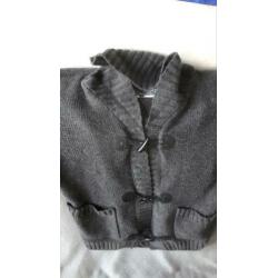 Grijs vest. Zo goed als nieuw.