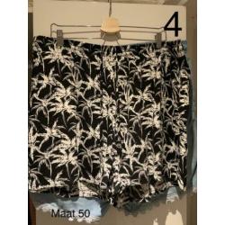 Mooie kleding van MS Mode maat staat op de foto
