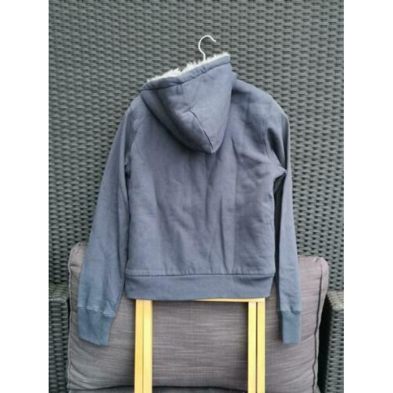 Madonna donkerblauw vest maat 38.