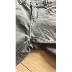 Zgan grijze skinny jeans met bies maat 152