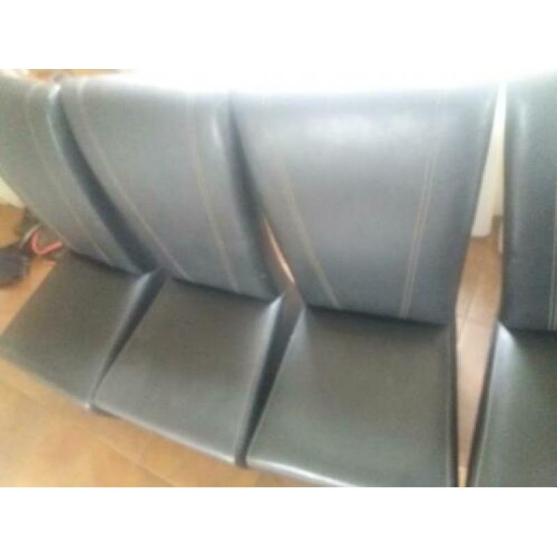 4 leren stoelen