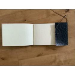 Lederen album met handgeschept papier