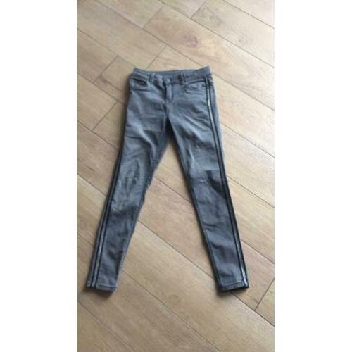 Zgan grijze skinny jeans met bies maat 152