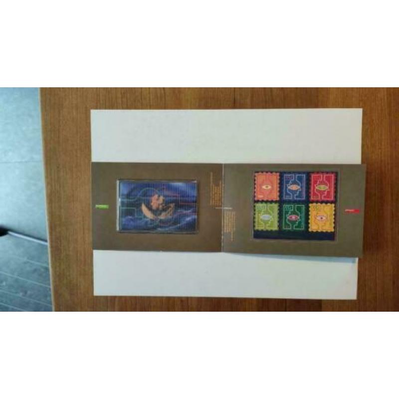 Telefoonkaart en postzegels uit 1997 van KPN en PTT post