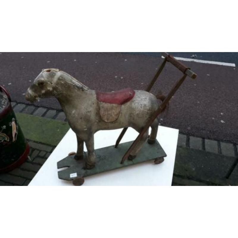 Antiek speelgoed paard / duw en trek speelgoed rond 1880