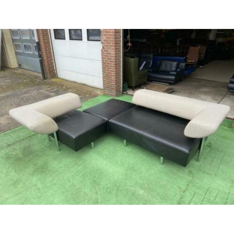 COR ARTHE verstelbaar zwart design leren bankstel met hocker