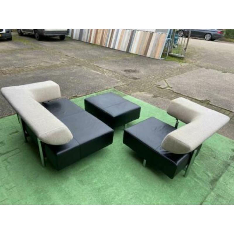 COR ARTHE verstelbaar zwart design leren bankstel met hocker