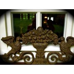 Wandornament gietijzer in de kleur green-rust-duif