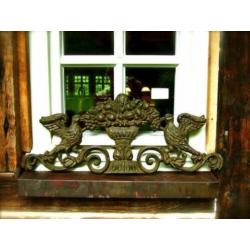 Wandornament gietijzer in de kleur green-rust-duif