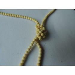 Lange ivoren Charleston ketting