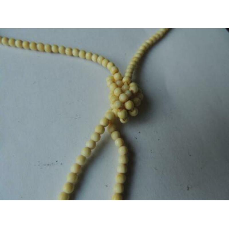 Lange ivoren Charleston ketting