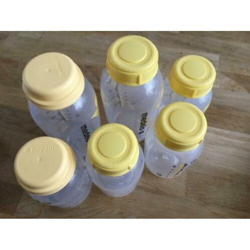 Medela Swing met extra 2x250ml, 3x150ml flessen