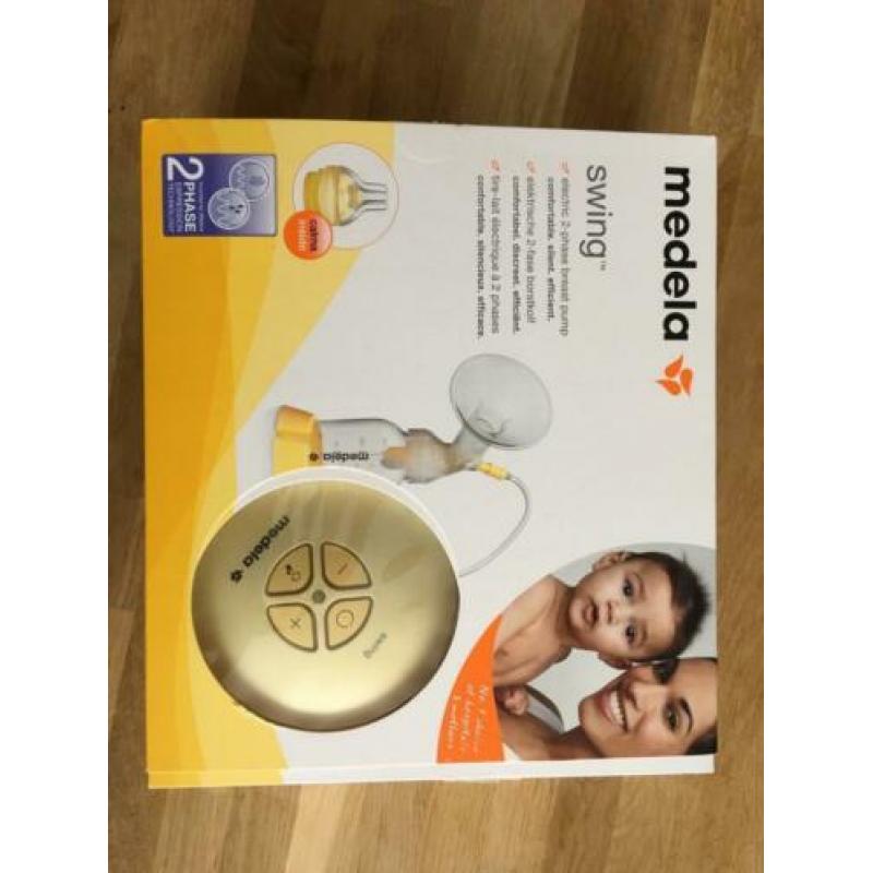 Medela Swing met extra 2x250ml, 3x150ml flessen