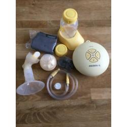 Medela Swing met extra 2x250ml, 3x150ml flessen