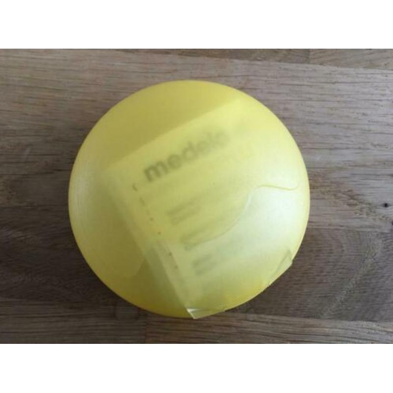 Medela Swing met extra 2x250ml, 3x150ml flessen