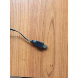 Toetsenbord met leren houder voor een tablet.