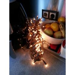 kerstspullen bruin deco vor boom