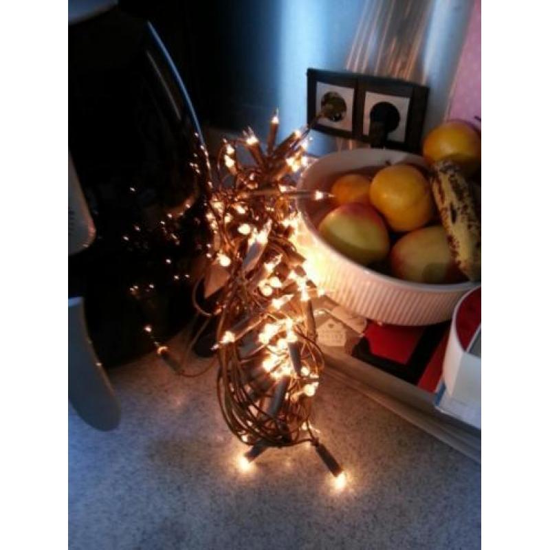 kerstspullen bruin deco vor boom